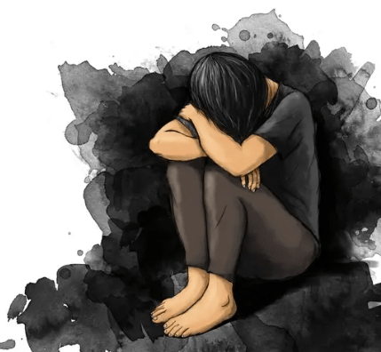 A person sitting on the ground, hugging their knees with their head down, surrounded by a dark, abstract background, conveying a sense of sadness or distress.
